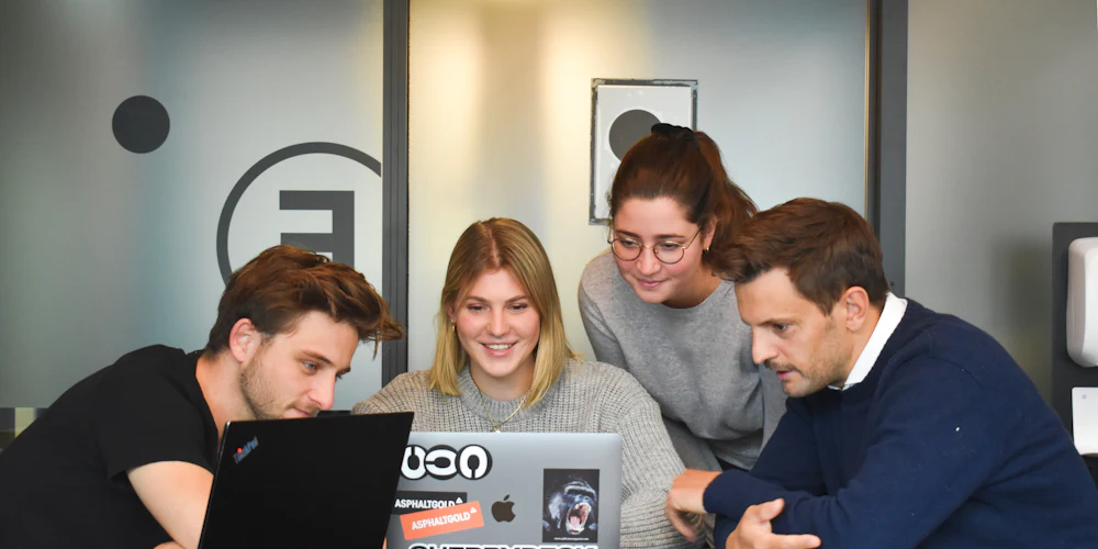 Colleagues working together in a modern office