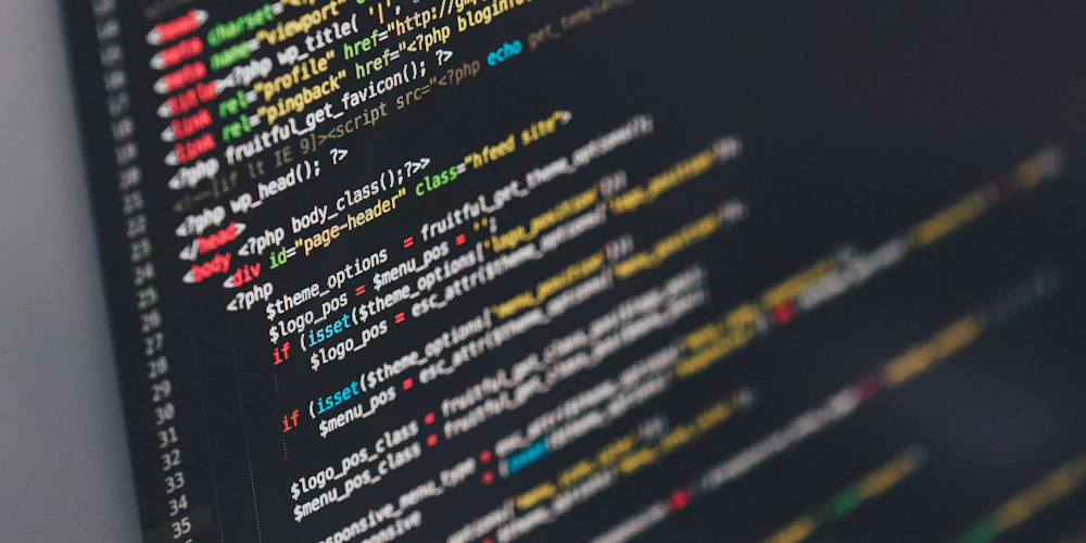 Close-up of website code on a developer’s monitor